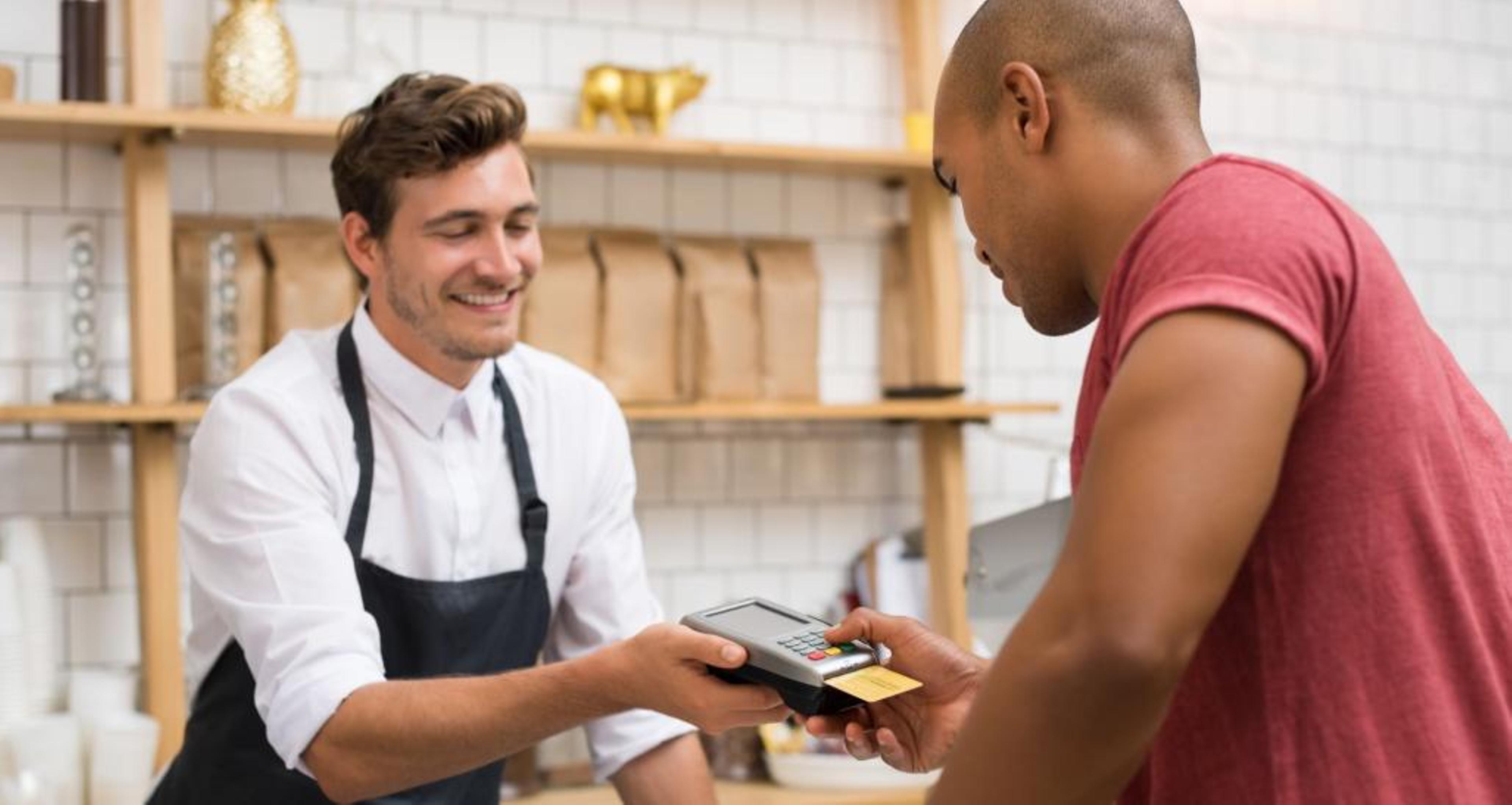 Shopper paying with a credit card.