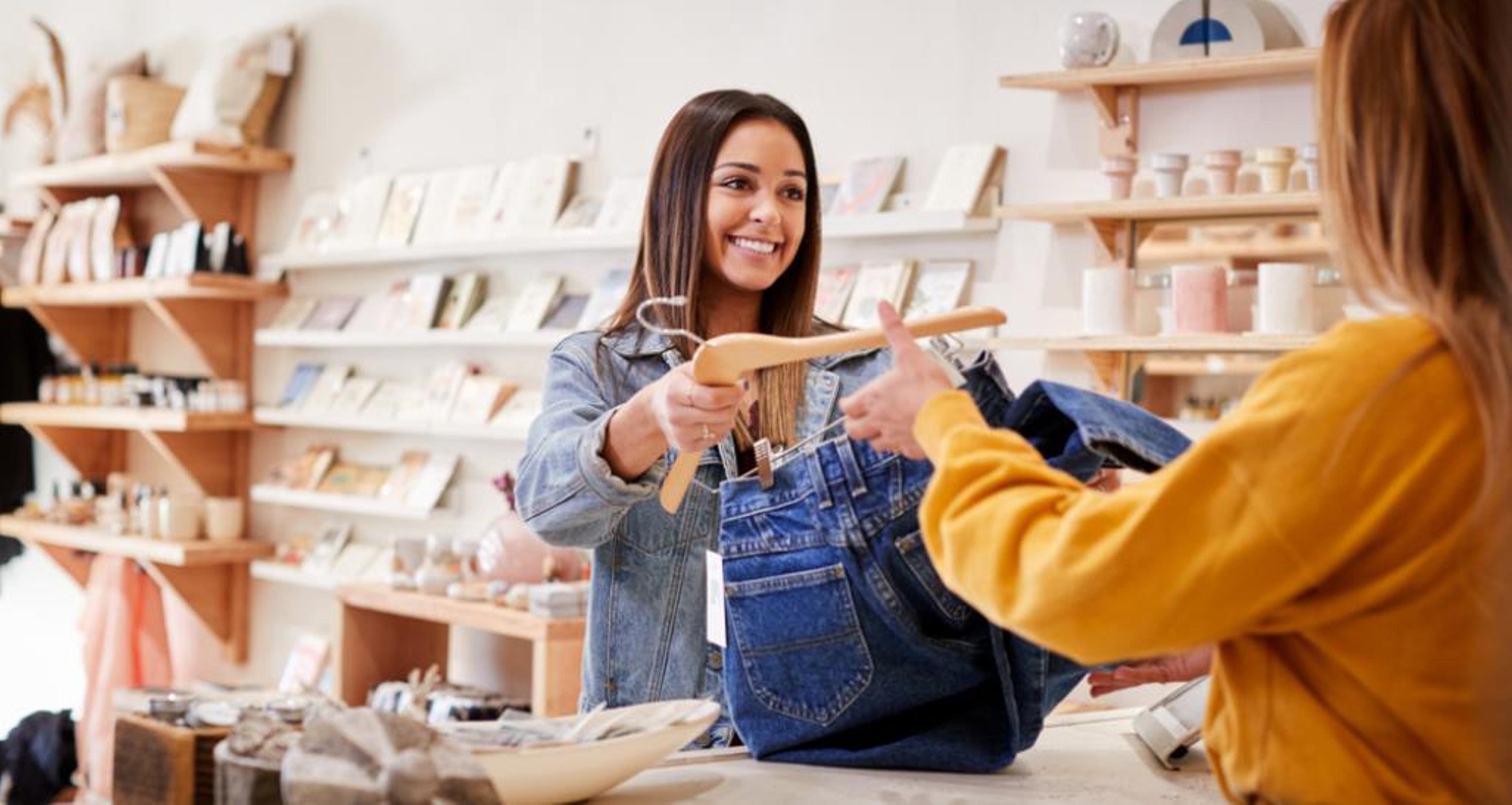 A woman checking out in a store.