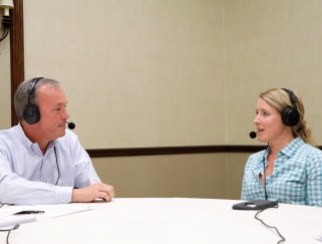 Brittany Underwood (right) chats with host Bill Thorne (left)