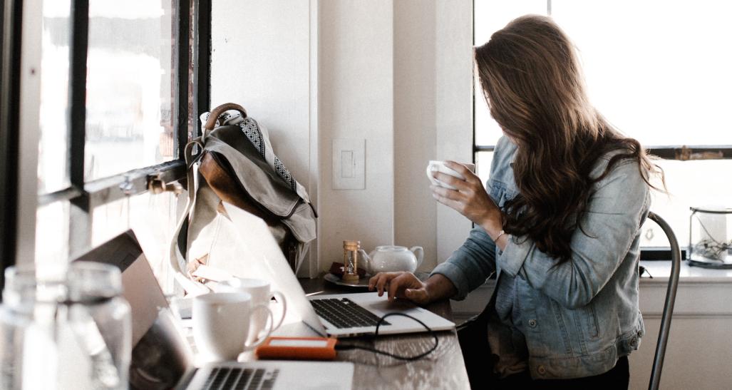 girl on computer in a coffee shop