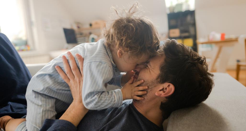 Father and baby at home