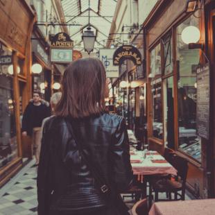 Unsplash woman walking through shopping experience